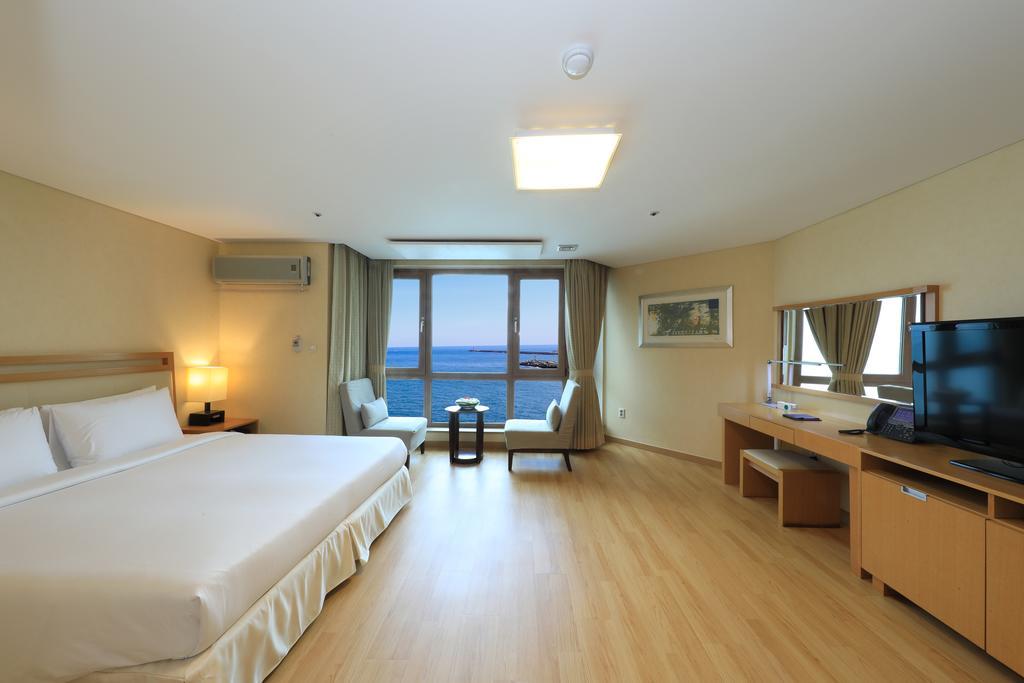 Ocean Suites Jeju Hotel Quarto foto